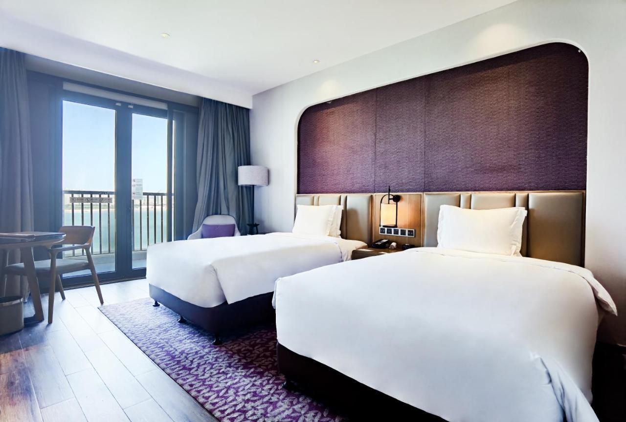 Отель Crowne Plaza Qingdaoorientalmoviemetropolis By Ihg Экстерьер фото