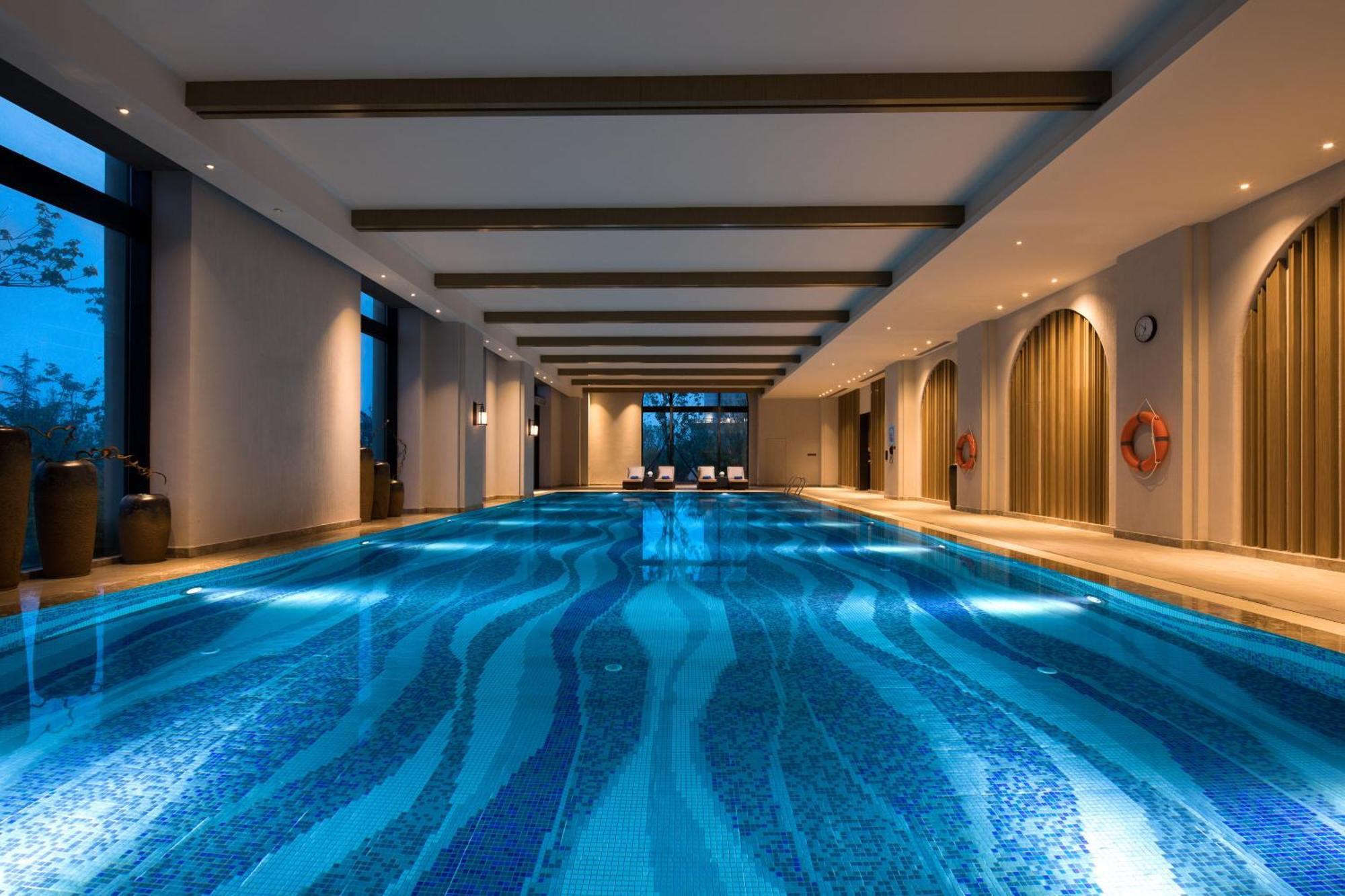 Отель Crowne Plaza Qingdaoorientalmoviemetropolis By Ihg Экстерьер фото